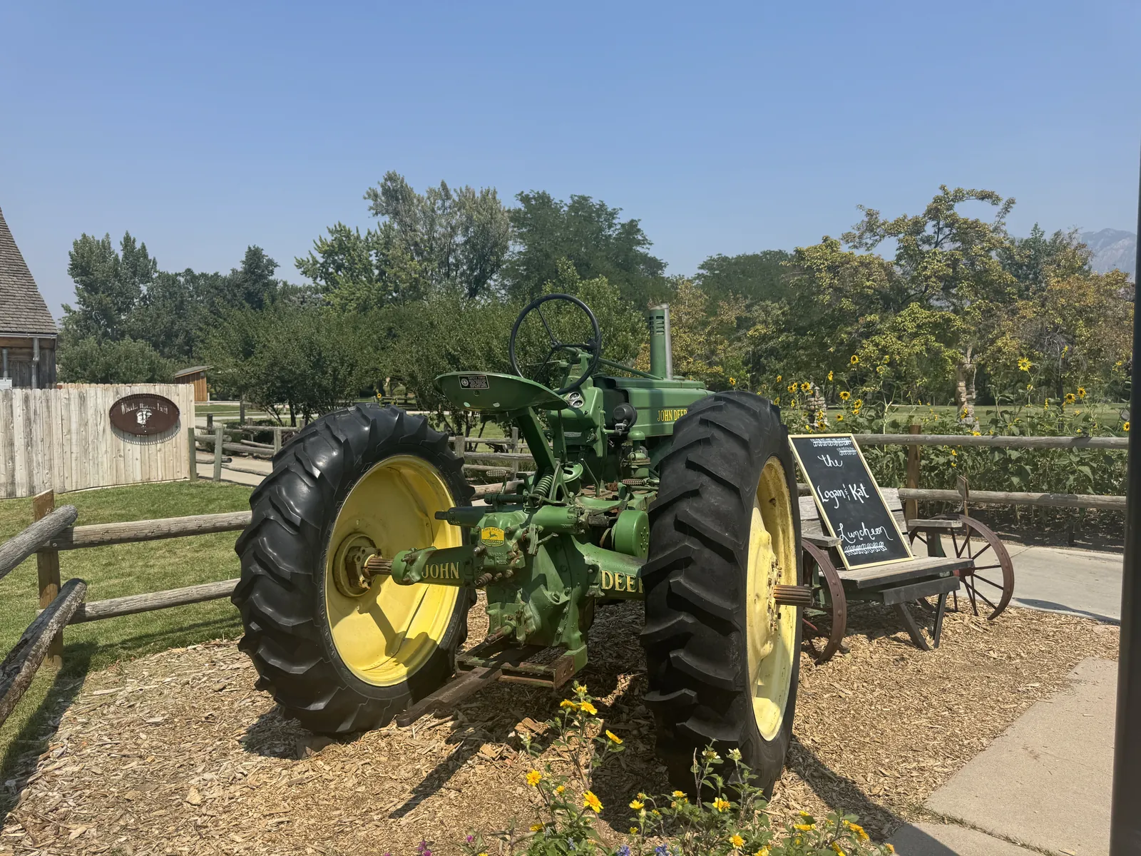 A tractor displayed during a farming museum visit.