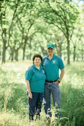 Gene and Eileen in the pecan orchard at Yegua Creek Farms.